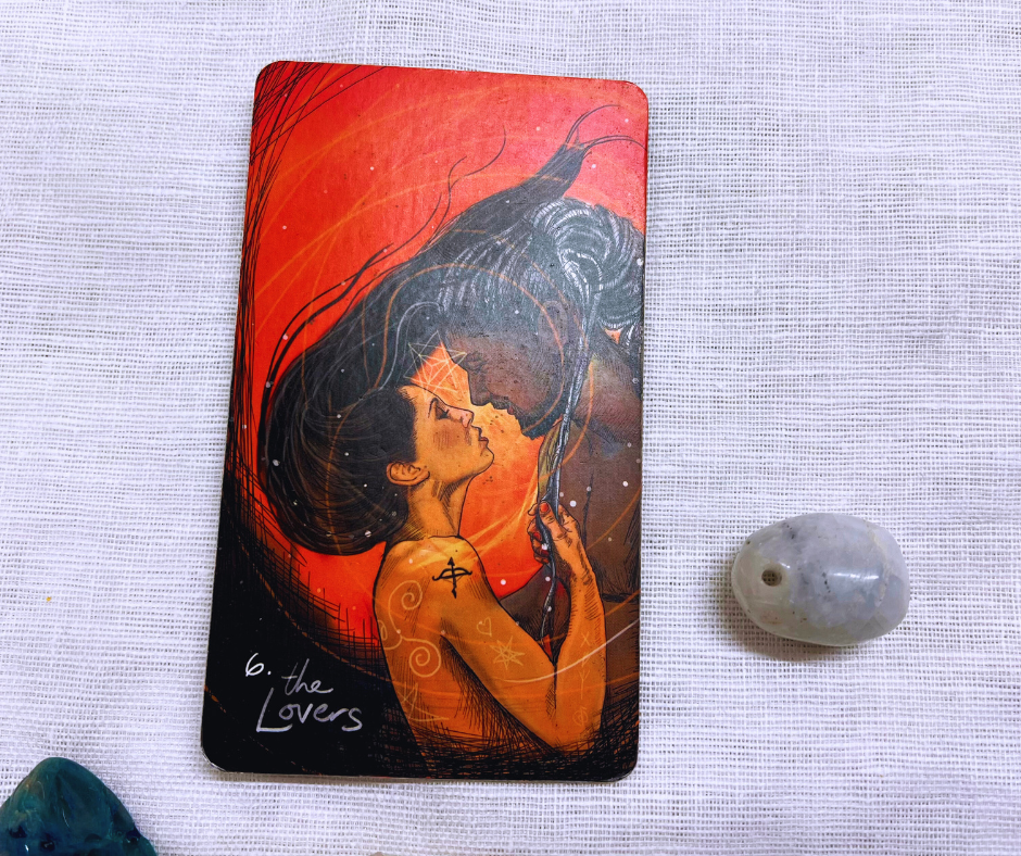 Photo of lovers card with a crystal